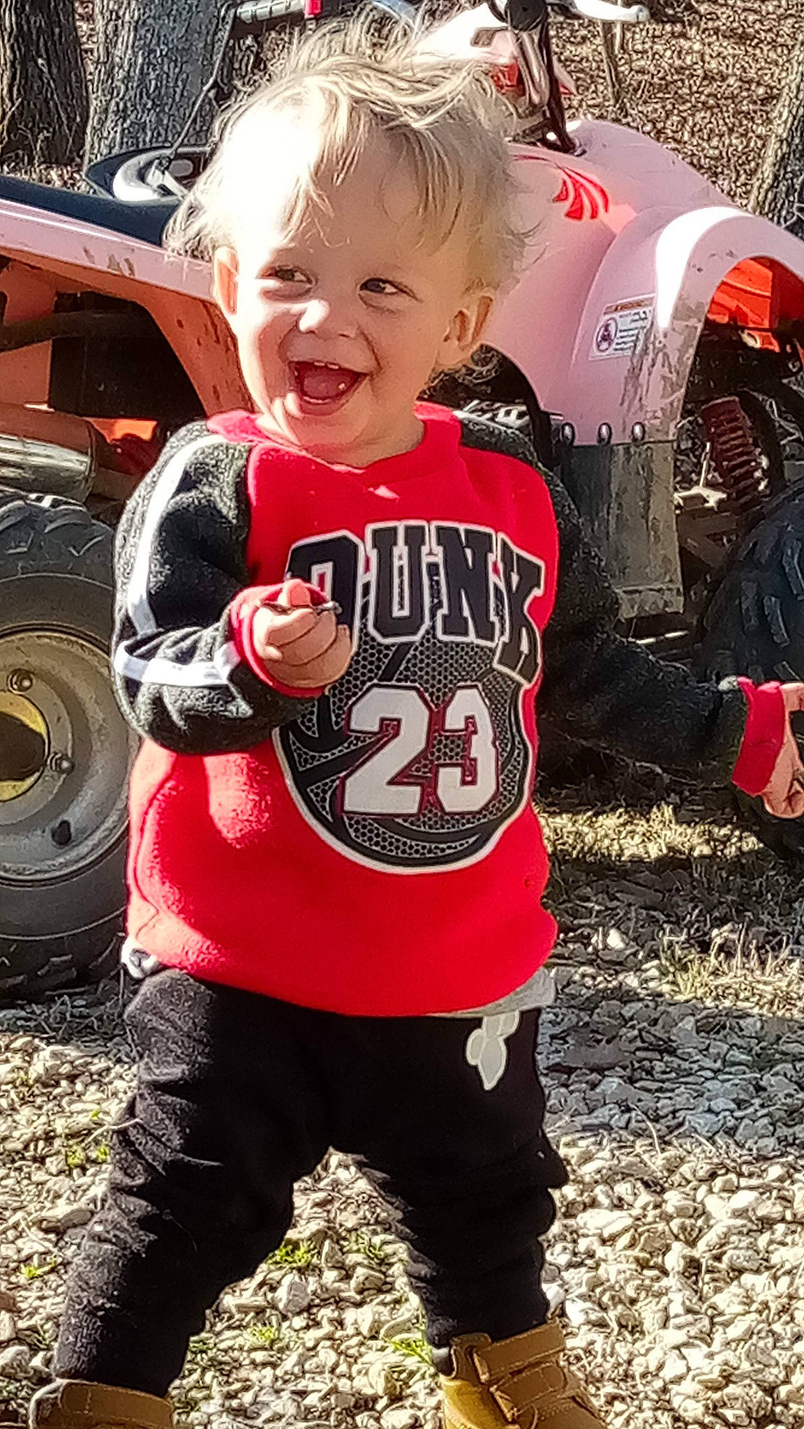 Dennis joined the competition — help win amazing prizes! asphalt, automotive_exterior, automotive_tire, child, cool, fun, hairstyle, happy, jersey, motor_vehicle, person, personal_protective_equipment, pink, sleeve, smile, sportswear, style, t_shirt, tire, toddler