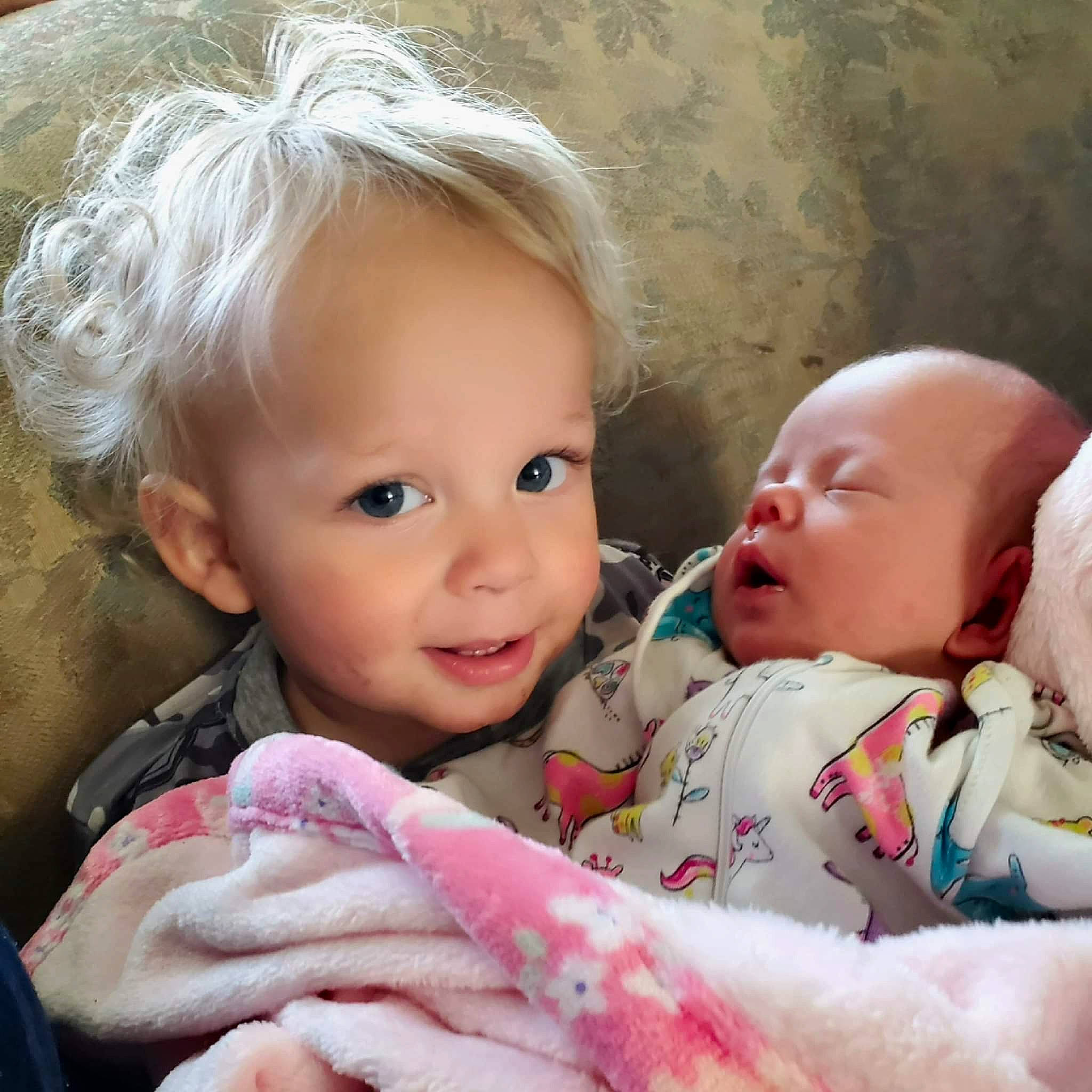 Dennis is registered to the contest to win money with this photo: baby, baby_toddler_clothing, cheek, chin, comfort, ear, eye, eyebrow, gesture, hand, happy, head, iris, lip, mouth, nose, organ, person, product, skin