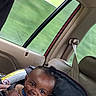 Bradley joined the competition — help win amazing prizes! baby, car_seat, smile, child, infant, seatbelt, window, car_interior, safety, happy, portrait, vehicle, seat, head, person, transportation, travel, cute, young_child, interior