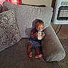 Bradley is registered to the contest to win money with this photo: baby, bottle, couch, cushion, drinking, furniture, indoors, infant, person, portrait, sitting, toddler, wall, window, curtain, heater, carpet, clothing, foot, hand
