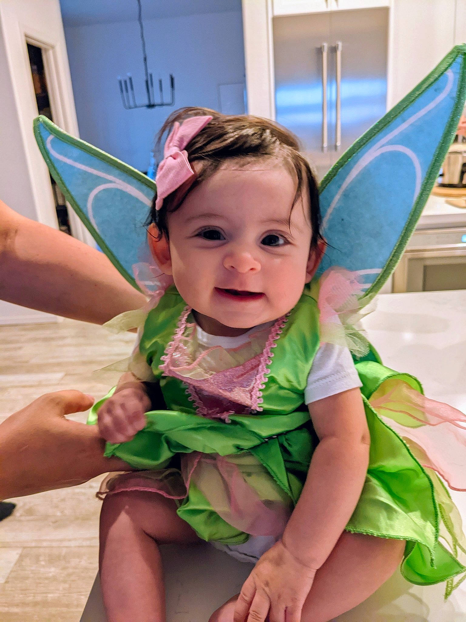 Emery is registered to the contest to win money with this photo: baby, baby_products, baby_toddler_clothing, child, fashion_accessory, fun, grass, hair_accessory, hairstyle, happy, leisure, magenta, person, pink, play, purple, sitting, smile, summer, toddler