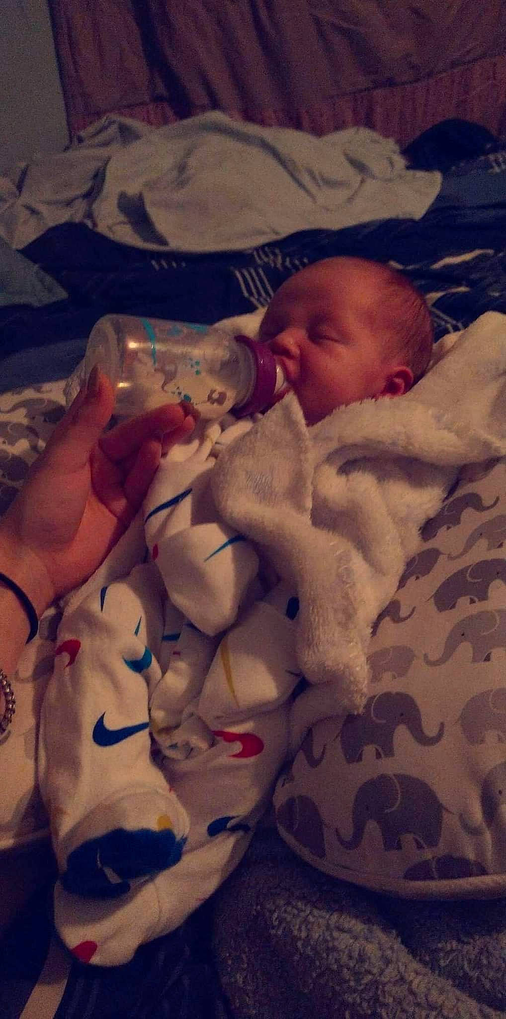 Eli joined the competition — help win amazing prizes! baby, baby_products, baby_safety, baby_sleeping, baby_toddler_clothing, bedtime, cheek, child, comfort, eye, face, happy, human_body, linens, mammal, mouth, person, skin, textile, toddler