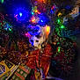 animal, cat, celebration, christmas, christmas_lights, christmas_tree, colorful_lights, curious_cat, decorations, feline, festive, festivity, floor, gift_wrap, holiday, holiday_season, indoor, pets, presents, tinsel