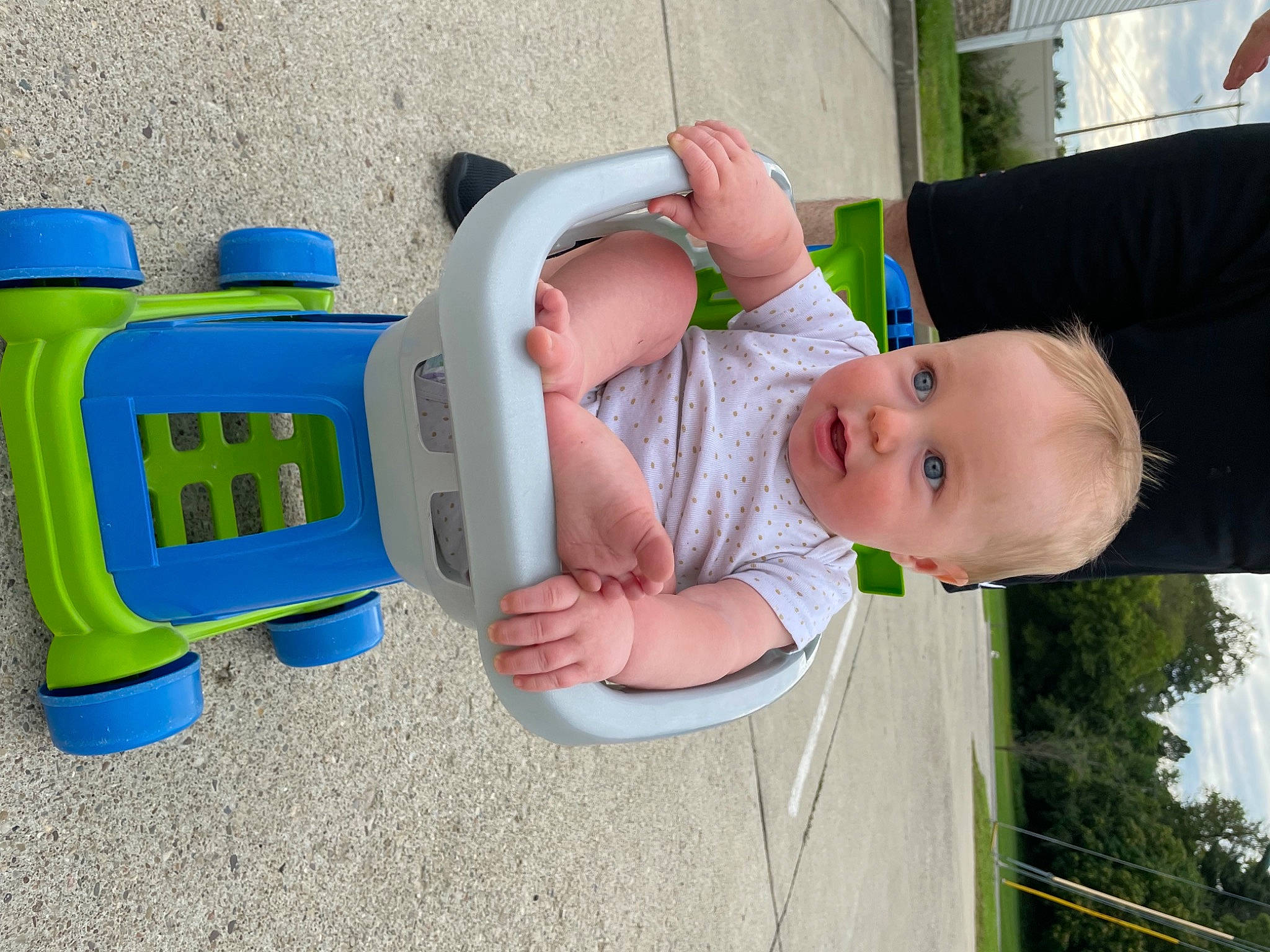 Grant is registered to the contest to win money with this photo: baby, baby_toddler_clothing, child, facial_expression, finger, fun, gesture, grass, hairstyle, hand, happy, hat, leisure, person, plastic_bottle, recreation, smile, summer, toddler, toy