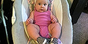 Lakelynn joined the competition — help win amazing prizes! baby, infant, bow, pink_outfit, baby_swing, floral_pattern, plush_toy, caterpillar_toy, carpet, indoor, child, footwear, checkered_shoes, headband, cute, seated, soft_toy, furniture, person, home