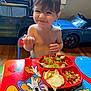 Kuiper is registered to the contest to win money with this photo: baby, cutlery, diningtable, dish, eating, face, food, fork, furniture, head, lunch, machine, meal, person, photography, portrait, snack, spoon, table, wheel