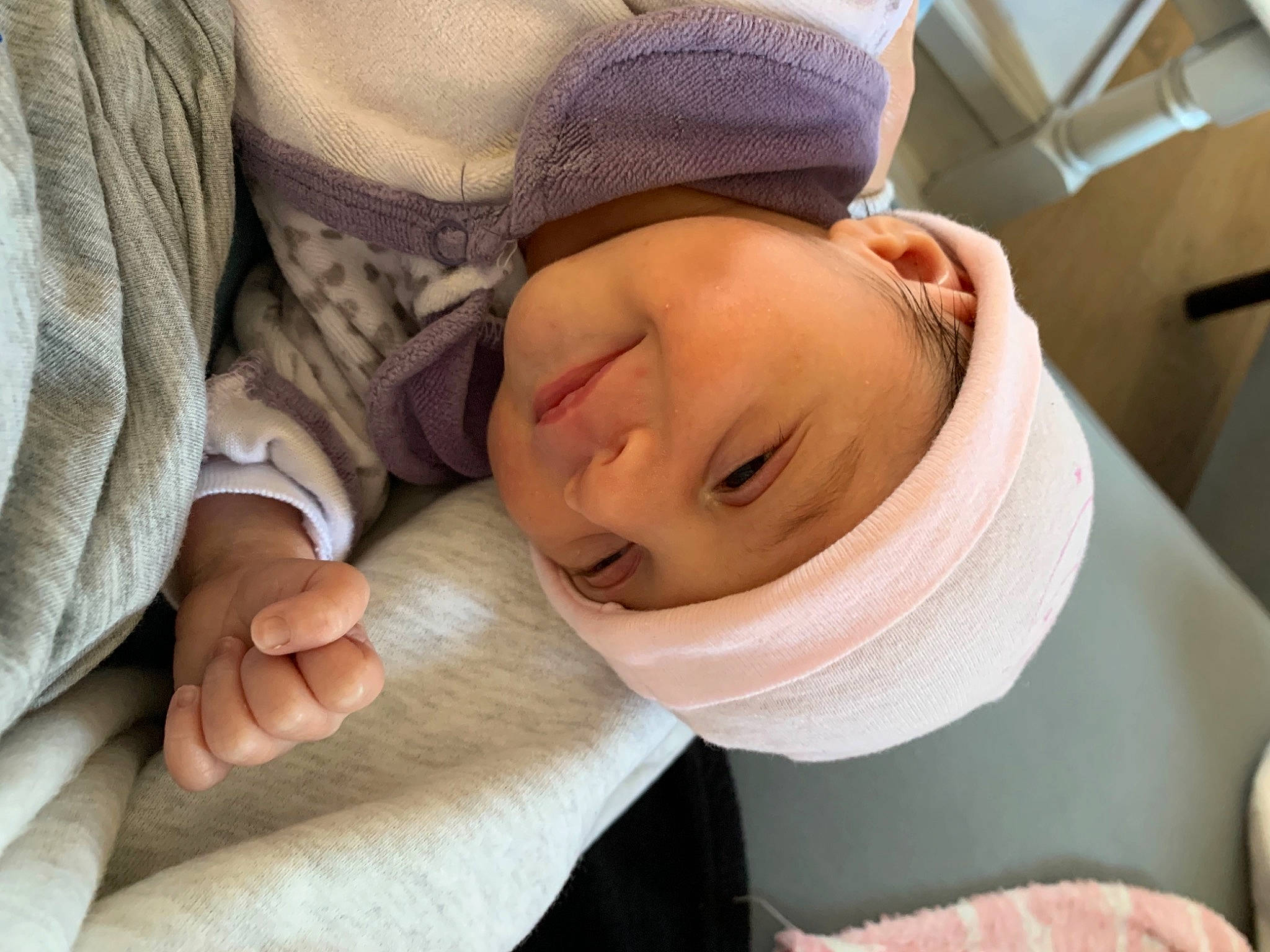 Nora participe au concours pour gagner de l'argent avec cette photo : baby, baby_products, baby_sleeping, baby_toddler_clothing, beanie, beige, blanket, bonnet, cap, cheek, child, comfort, headwear, knit_cap, linens, nap, nose, person, skin, sleep