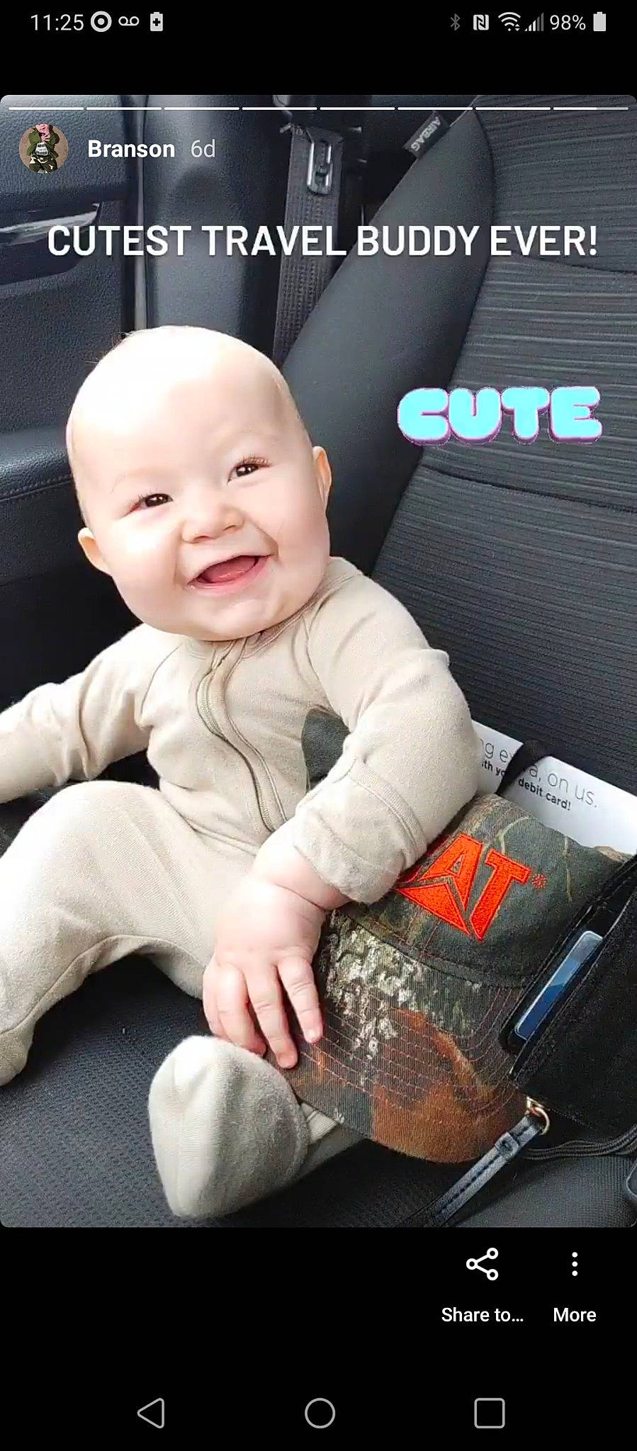 Branson is registered to the contest to win money with this photo: baby, baby_products, baby_toddler_clothing, car_seat, cheek, comfort, cool, electronic_device, face, finger, flash_photography, font, happy, joy, luggage_and_bags, person, product, sitting, sleeve, smile