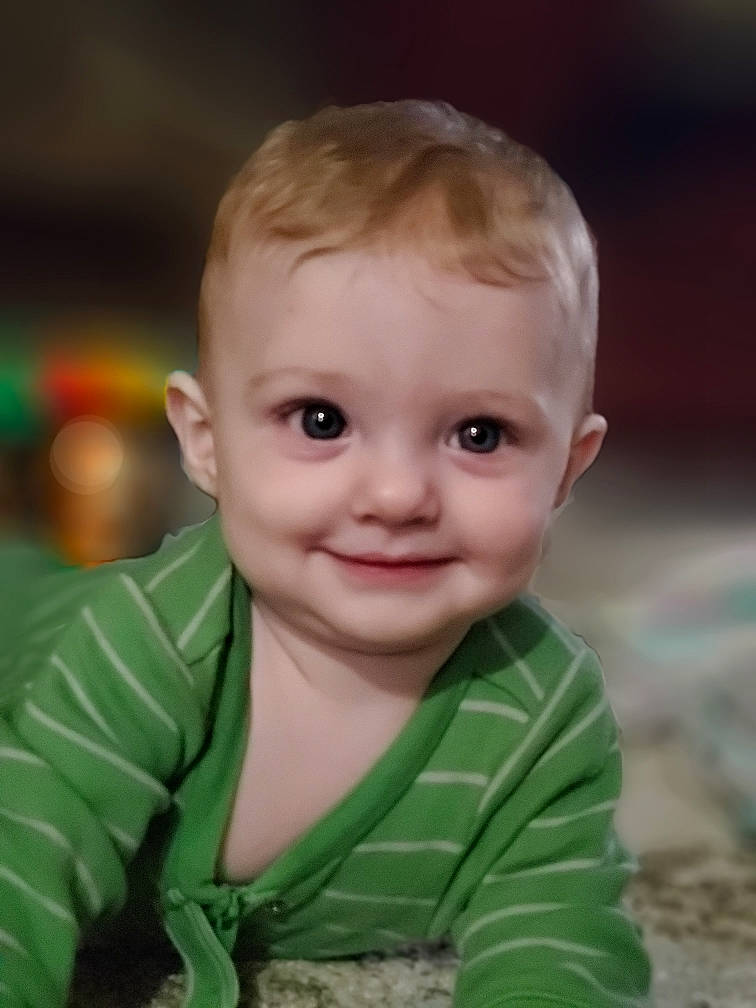 Hali is registered to the contest to win money with this photo: baby, blond, cheek, child, child_model, chin, eye, face, facial_expression, forehead, green, head, joy, lip, male, nose, person, portrait, portrait_photography, skin