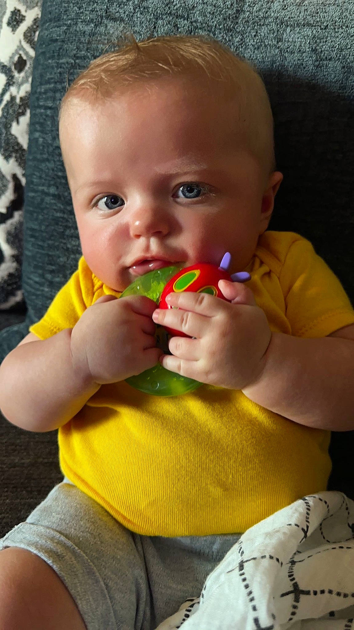 Sutton joined the competition — help win amazing prizes! baby, baby_products, baby_toddler_clothing, biting, cheek, child, face, finger, fun, happy, head, lip, mouth, nail, nose, person, skin, sweetness, thumb, toddler