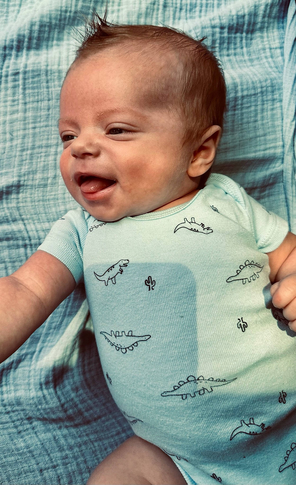 Sutton is registered to the contest to win money with this photo: baby, baby_toddler_clothing, cheek, chin, comfort, eye, face, forehead, gesture, happy, head, lip, mouth, muscle, neck, nose, person, skin, sleeve, smile