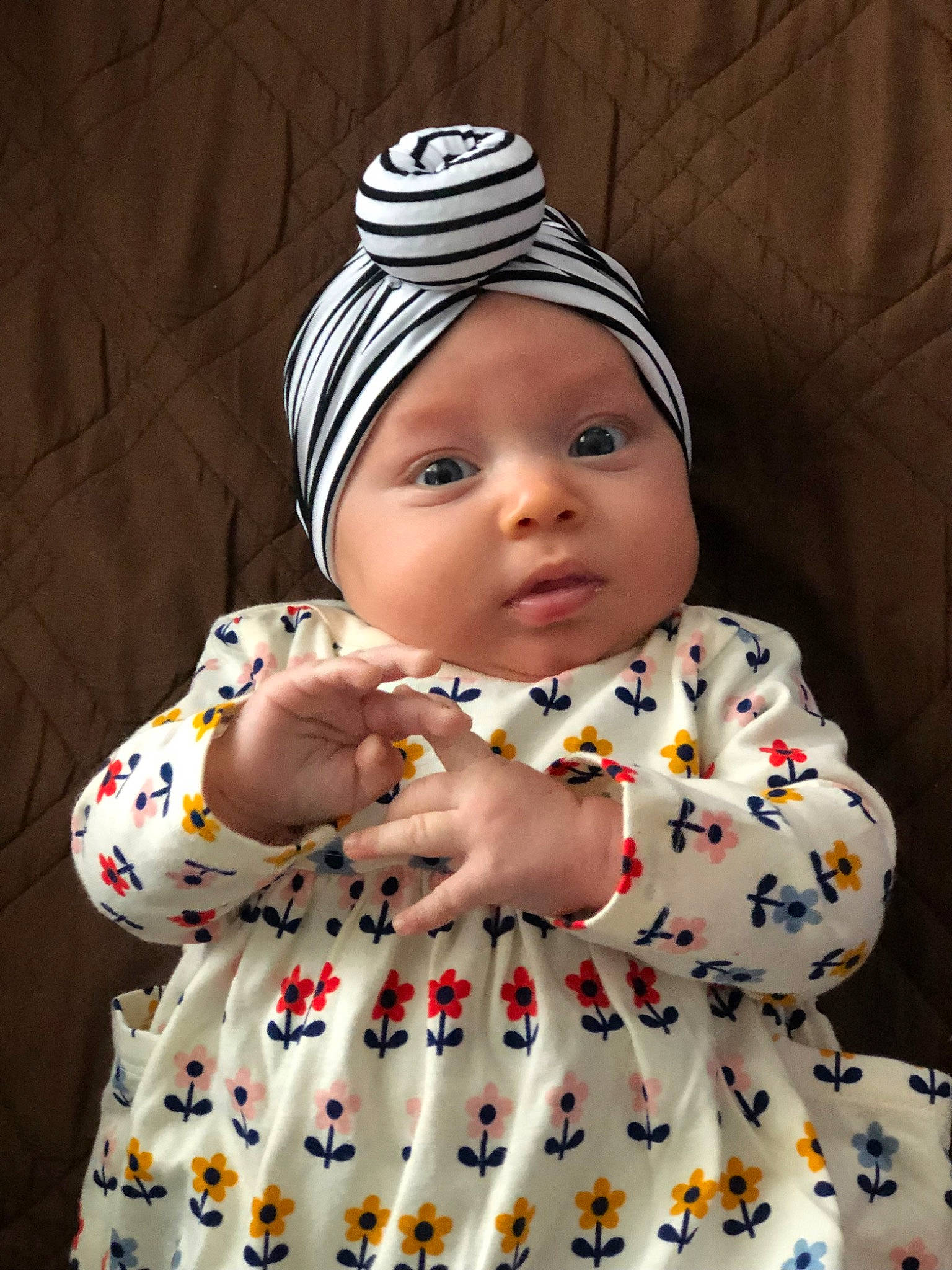 Avion is registered to the contest to win money with this photo: baby, baby_products, baby_toddler_clothing, cap, cheek, child, chin, clothing, design, eye, face, happy, head, headwear, knit_cap, linens, lip, pattern, person, skin