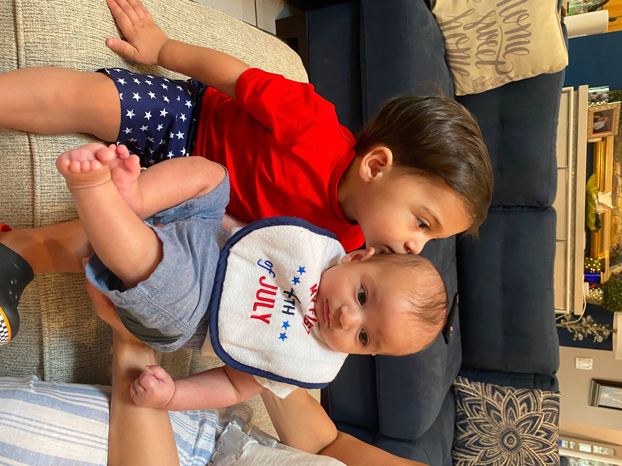 Massimo joined the competition — help win amazing prizes! arm, baby, baby_toddler_clothing, bookcase, child, elbow, event, fun, gesture, hand, happy, human_leg, knee, lap, leisure, person, shelf, shorts, thigh, toddler