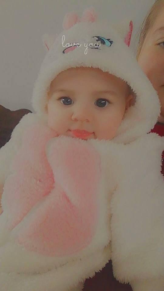 Eléna participe au concours pour gagner de l'argent avec cette photo : baby, cheek, child, eye, eyebrow, face, forehead, fur, head, headgear, headwear, iris, lip, mouth, nose, person, pink, skin, smile, toddler