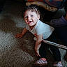 toddler, child, smiling, curly_hair, crawling, carpet, indoors, blankets, chair, clothing, shoes, person, happy, home, floor, casual, cute, young_child, baby, light
