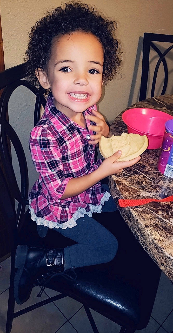 Za'Niya joined the competition — help win amazing prizes! cheek, child, child_model, joy, long_hair, person, plaid, play, sitting, smile, toddler