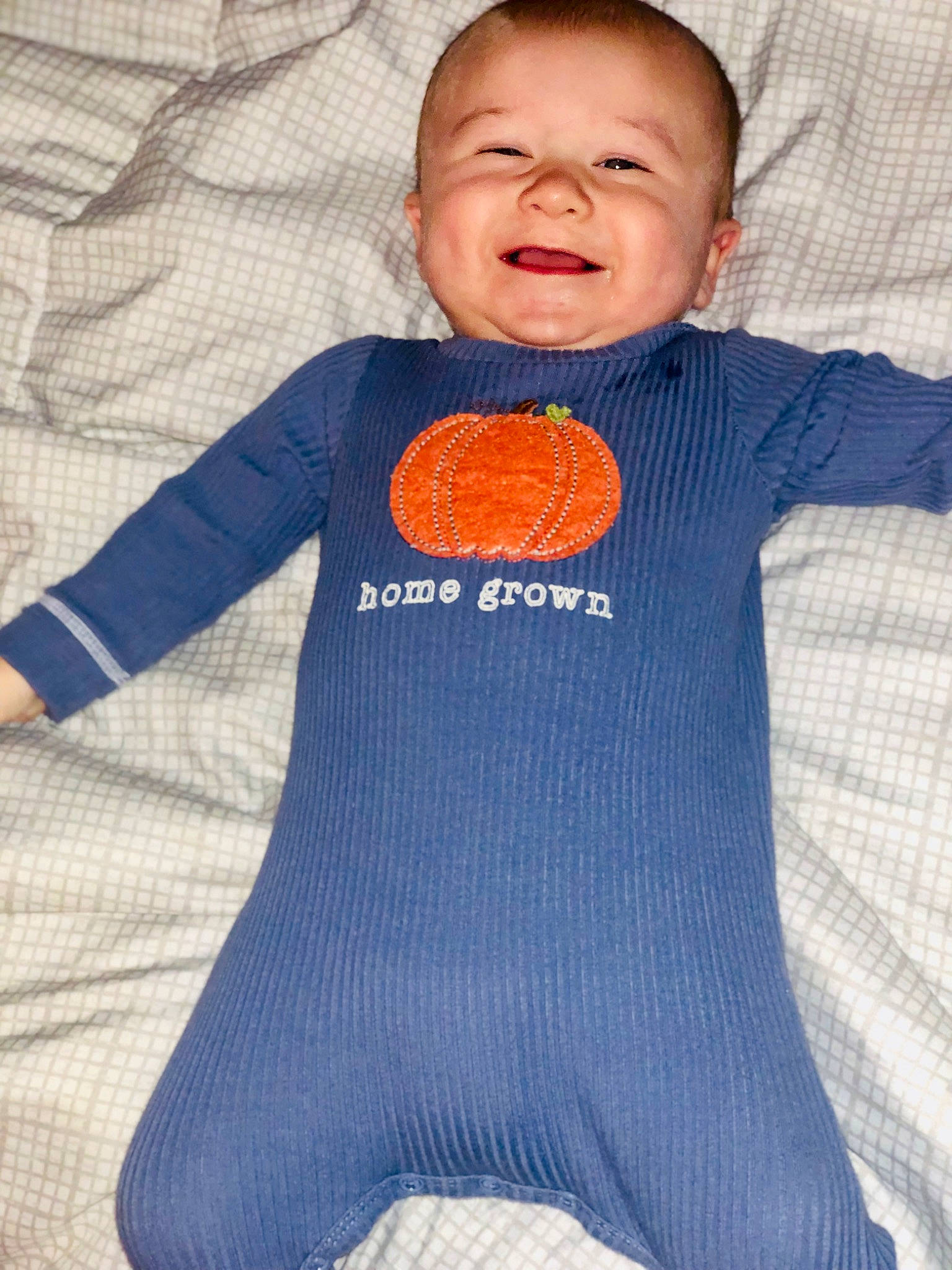 Beaux Bryan Larsen joined the competition — help win amazing prizes! baby, baby_toddler_clothing, clothing, electric_blue, flooring, jersey, linens, orange, outerwear, pattern, person, sleeve, smile, sportswear, t_shirt, textile, thumb, toddler, vegetable, wool