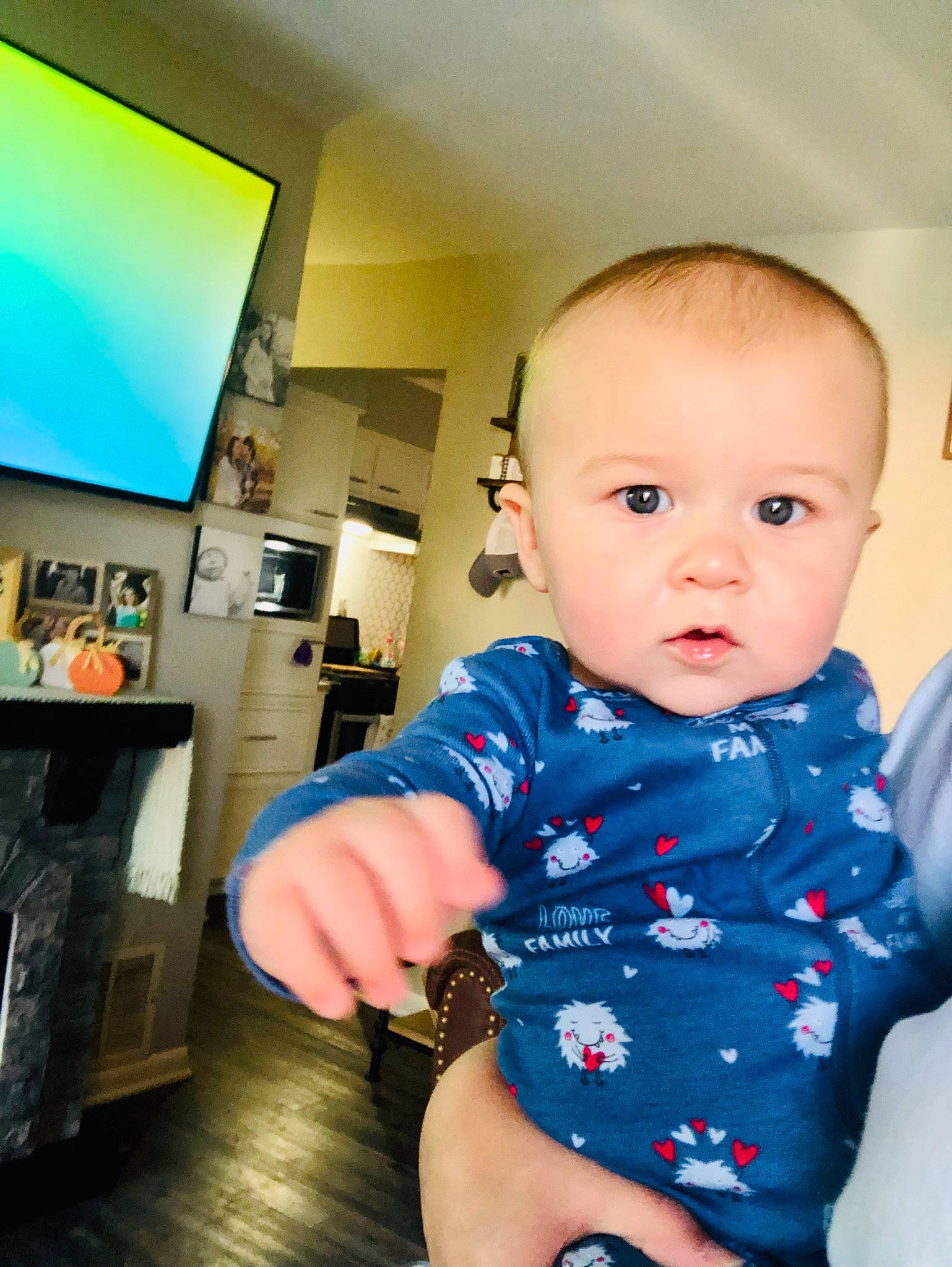 Beaux Bryan Larsen joined the competition — help win amazing prizes! azure, baby, baby_toddler_clothing, cheek, child, electric_blue, flooring, fun, happy, human_leg, iris, neck, pattern, person, room, sitting, skin, sleeve, standing, t_shirt
