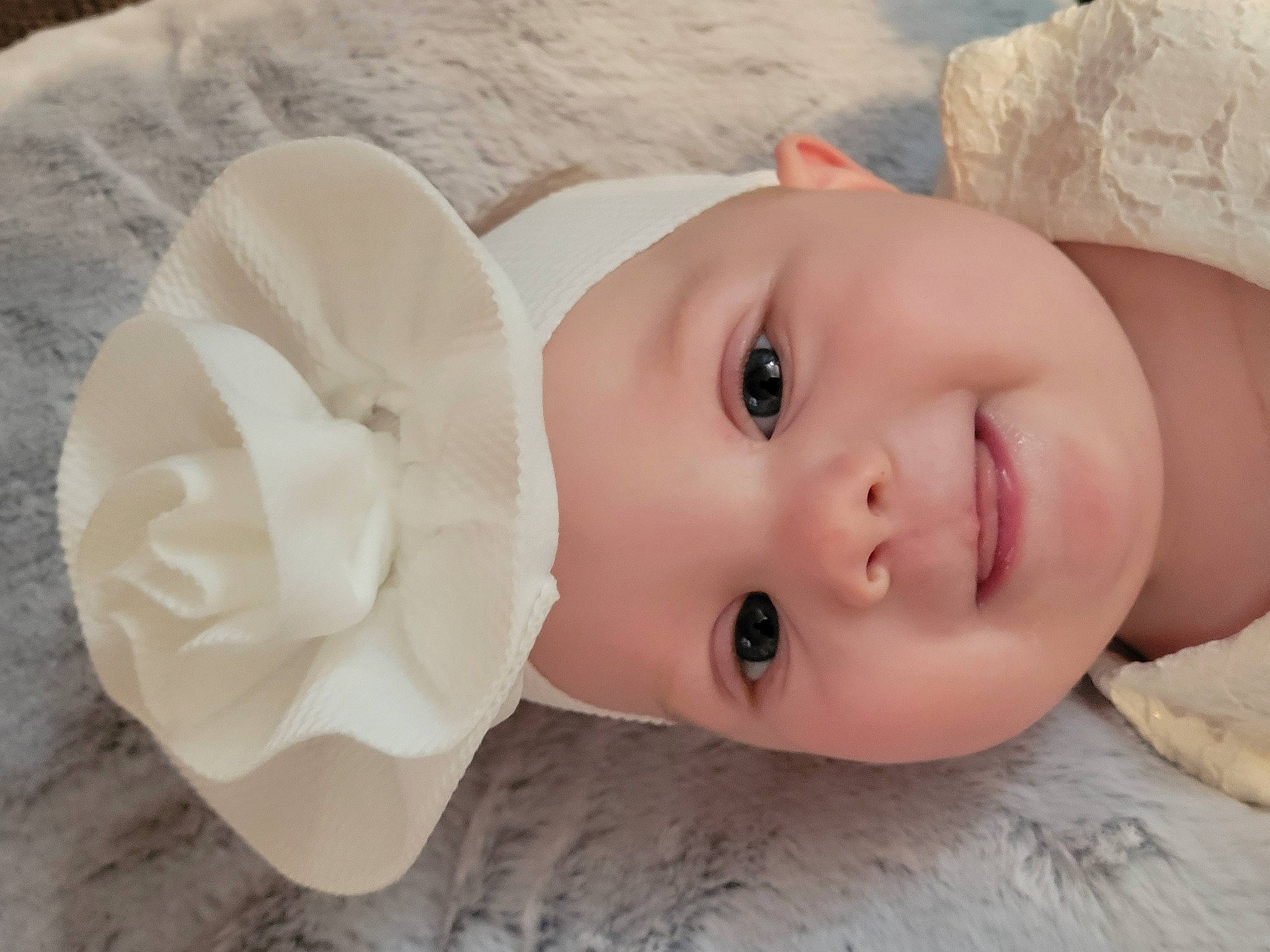 Carolina joined the competition — help win amazing prizes! baby, cheek, child, chin, eye, eyebrow, eyelash, flash_photography, happy, headgear, headpiece, headwear, iris, lip, neck, nose, person, petal, skin, smile