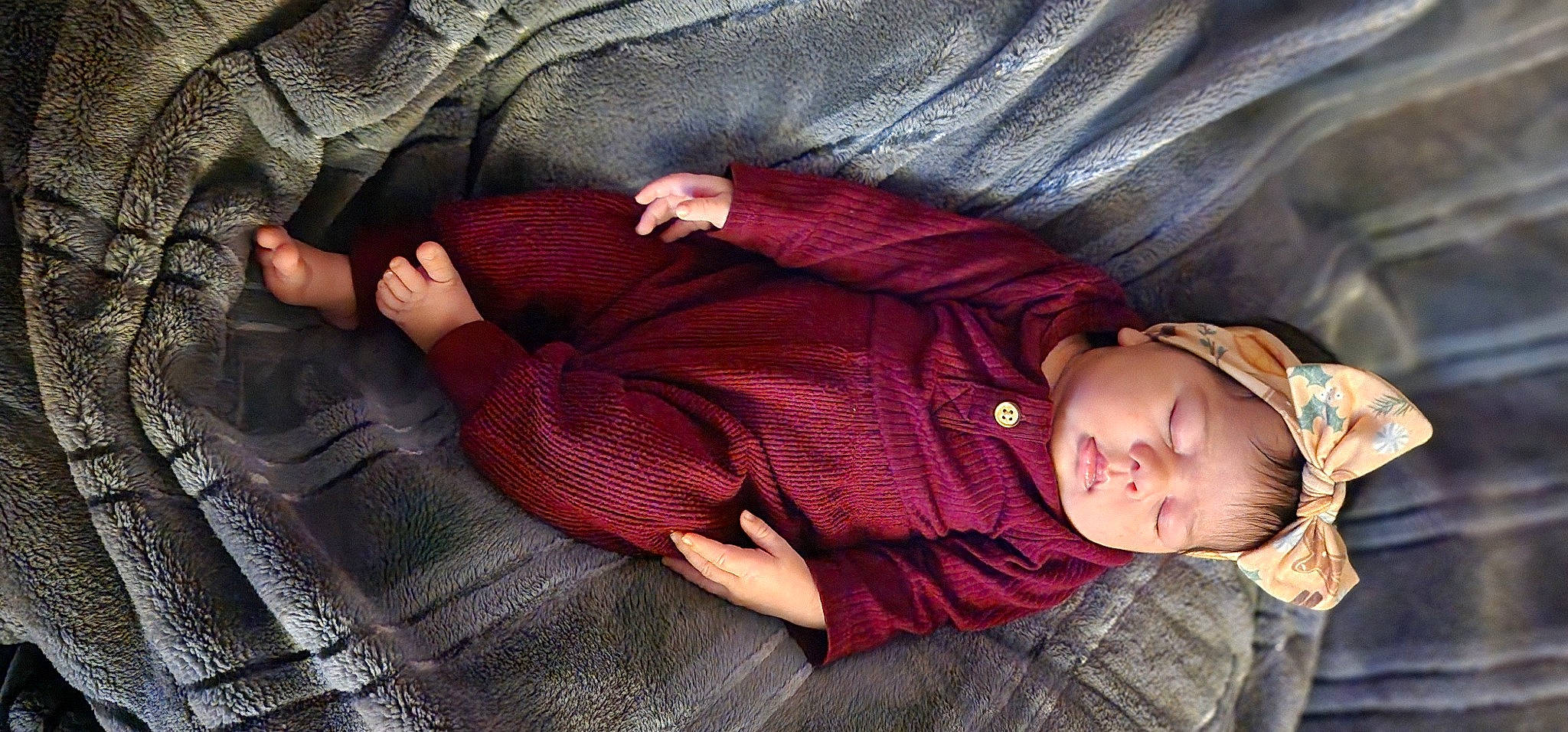 Emberly is registered to the contest to win money with this photo: baby, baby_toddler_clothing, carmine, cheek, child, comfort, finger, human_body, human_leg, lap, leg, mouth, nap, person, sitting, skin, sleeve, thigh, toddler, tree