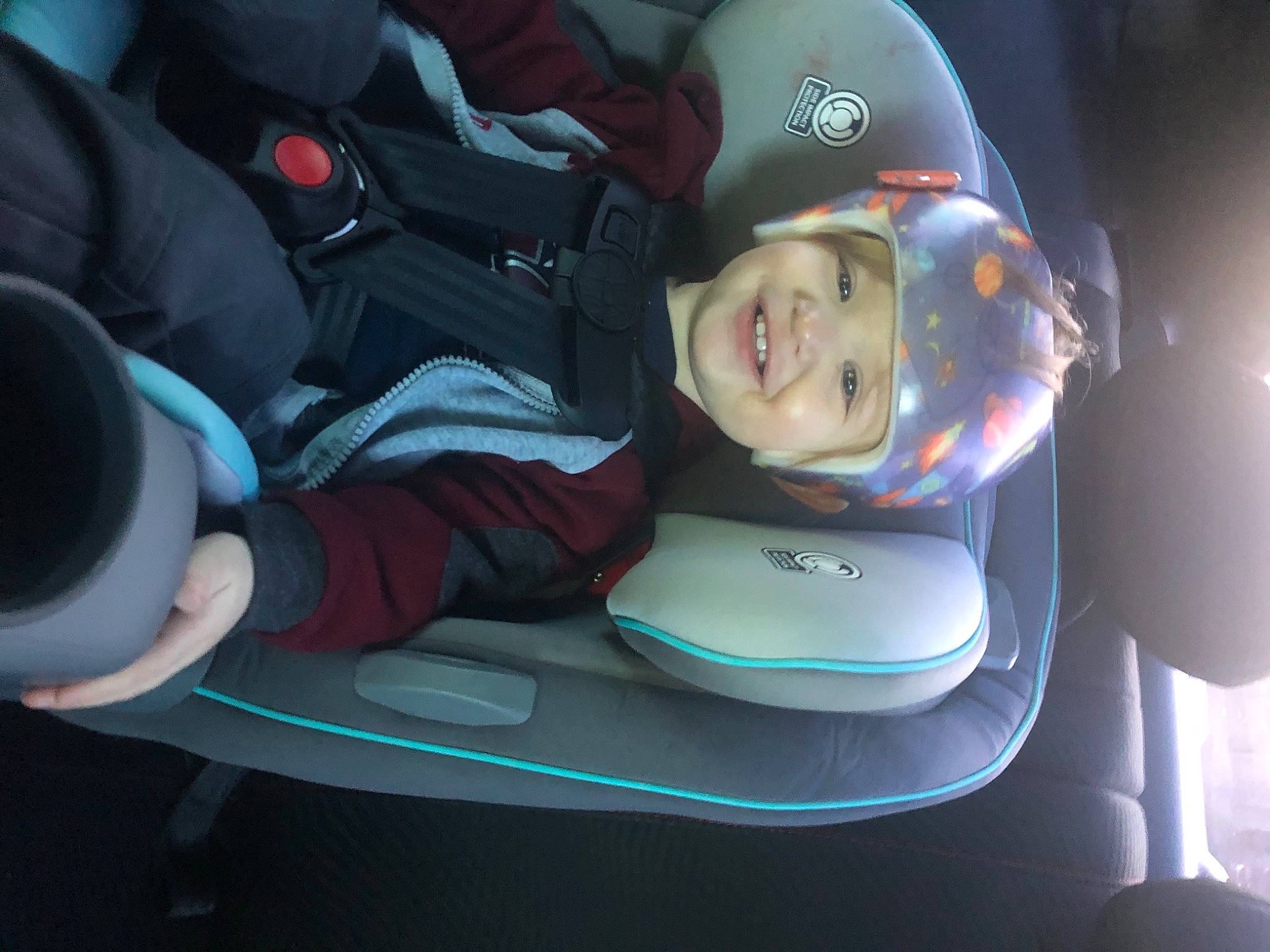 Jaxtyn is registered to the contest to win money with this photo: auto_part, automotive_design, automotive_exterior, automotive_lighting, baseball_cap, bumper, car_seat, electric_blue, family_car, fun, gadget, headgear, headwear, joy, motor_vehicle, person, personal_luxury_car, personal_protective_equipment, product, smile