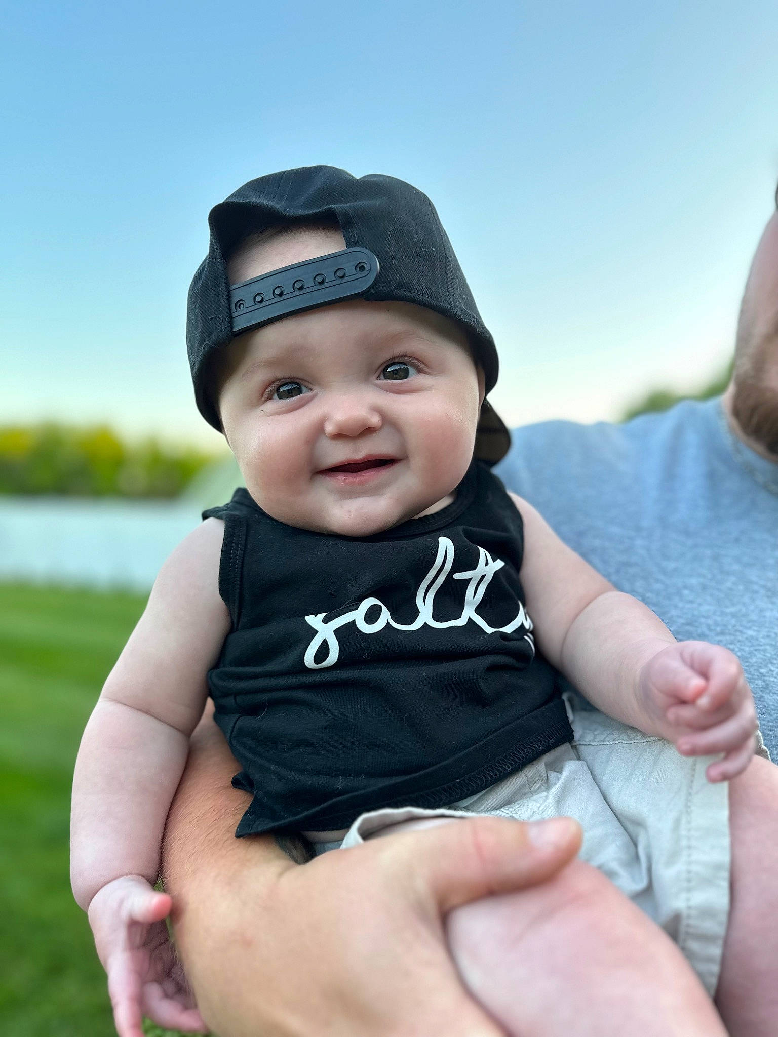 Clayton joined the competition — help win amazing prizes! baby, baby_toddler_clothing, baseball_cap, cap, child, cool, eye, flash_photography, fun, gesture, grass, happy, hat, head, headwear, joy, person, skin, sky, sleeve