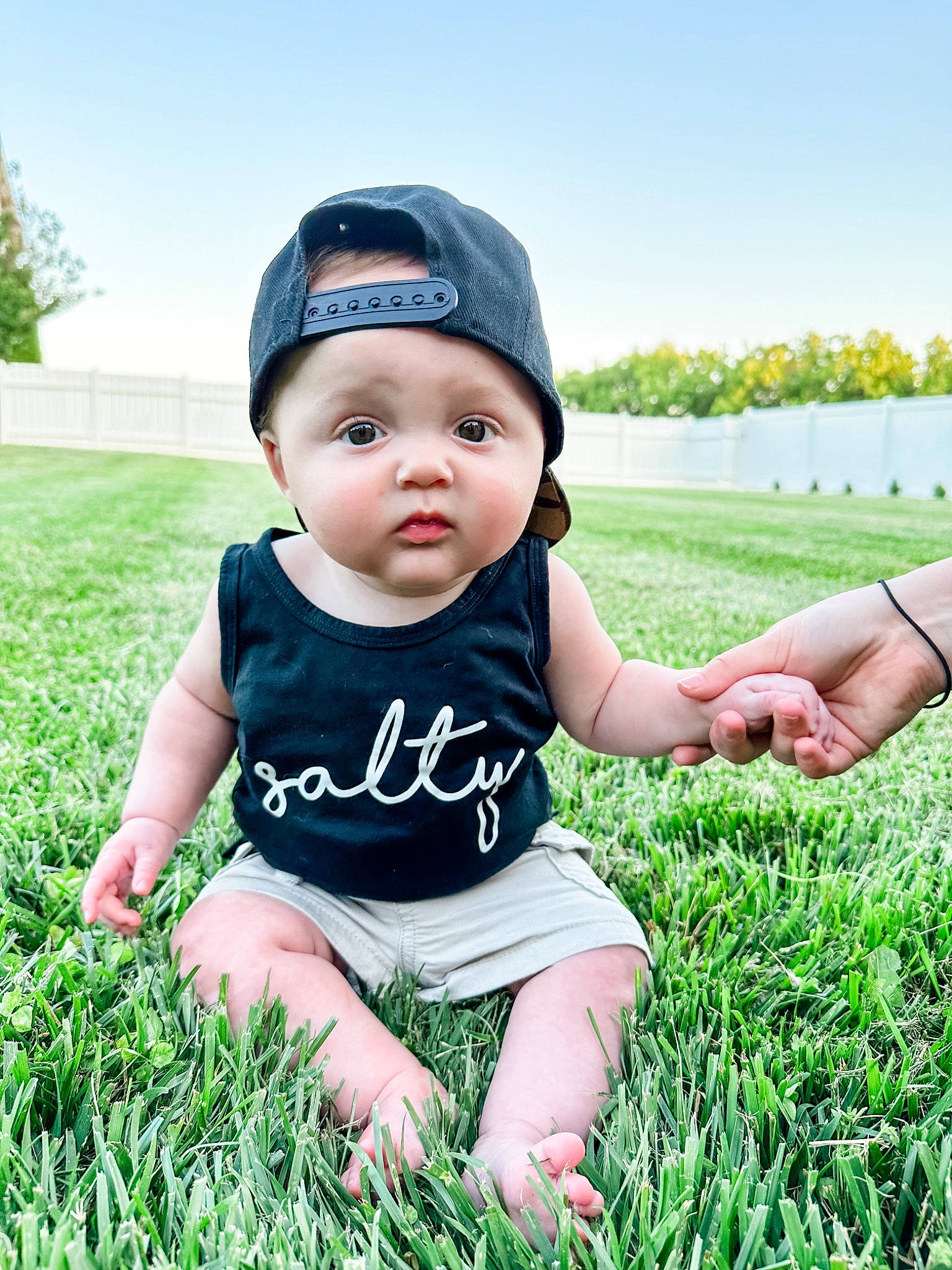 Clayton joined the competition — help win amazing prizes! baby, baby_toddler_clothing, baseball_cap, cap, child, grass, grass_family, grassland, happy, hat, headwear, lawn, leisure, meadow, people, people_in_nature, person, plant, sky, sleeve