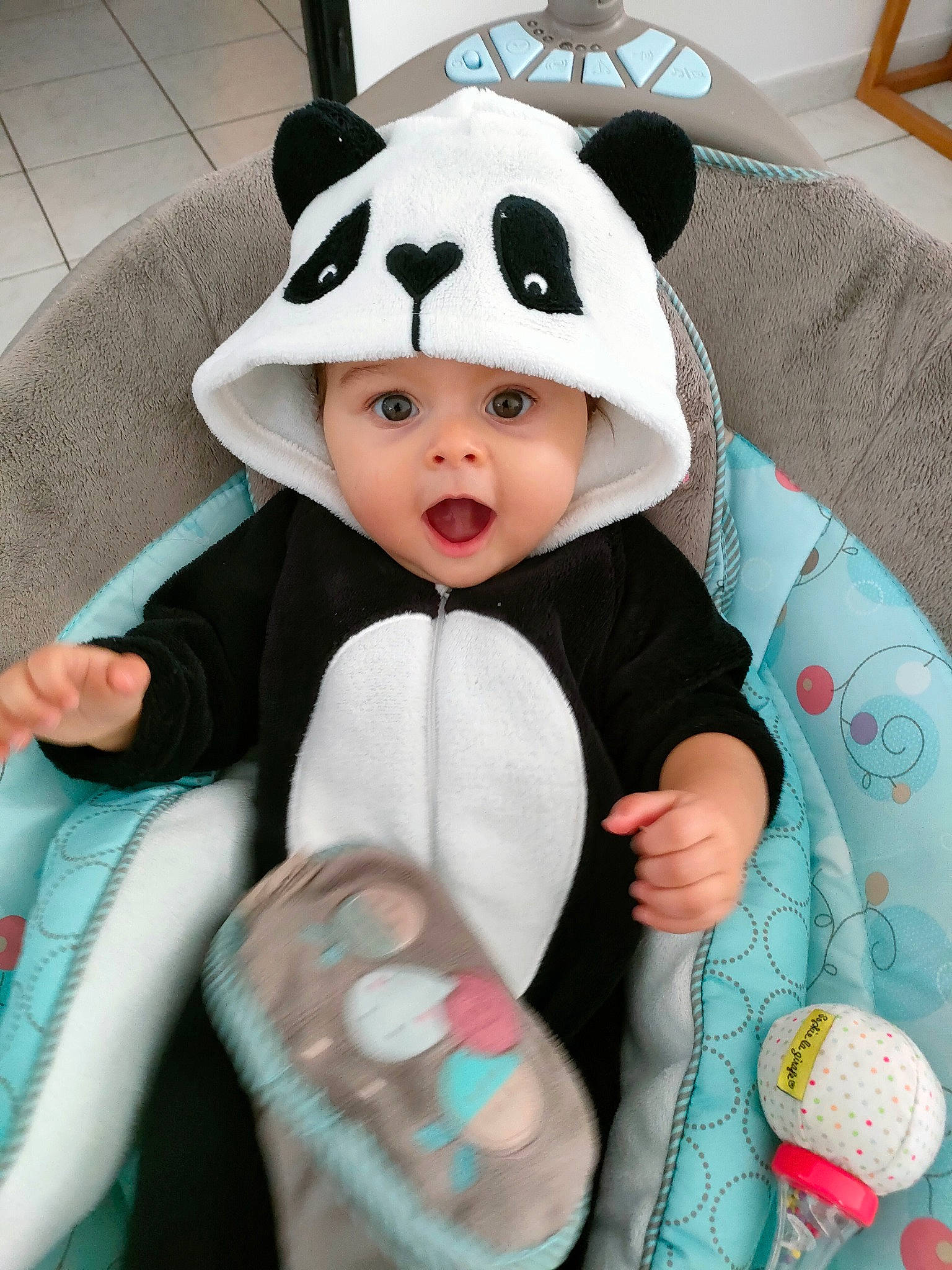 Ayana participe au concours pour gagner de l'argent avec cette photo : baby, baby_products, baby_toddler_clothing, cap, child, costume_hat, fur, head, headgear, headwear, linens, livestock, outerwear, pattern, person, pink, sitting, sleeve, stuffed_toy, surprise
