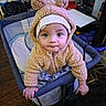 Leonardo joined the competition — help win amazing prizes! baby, child, fuzzy_hoodie, bear_ears, playpen, indoor, curious, wide_eyes, clothing, hand, face, person, infant, cute, warm_clothing, wooden_floor, blanket, hat, expression, home