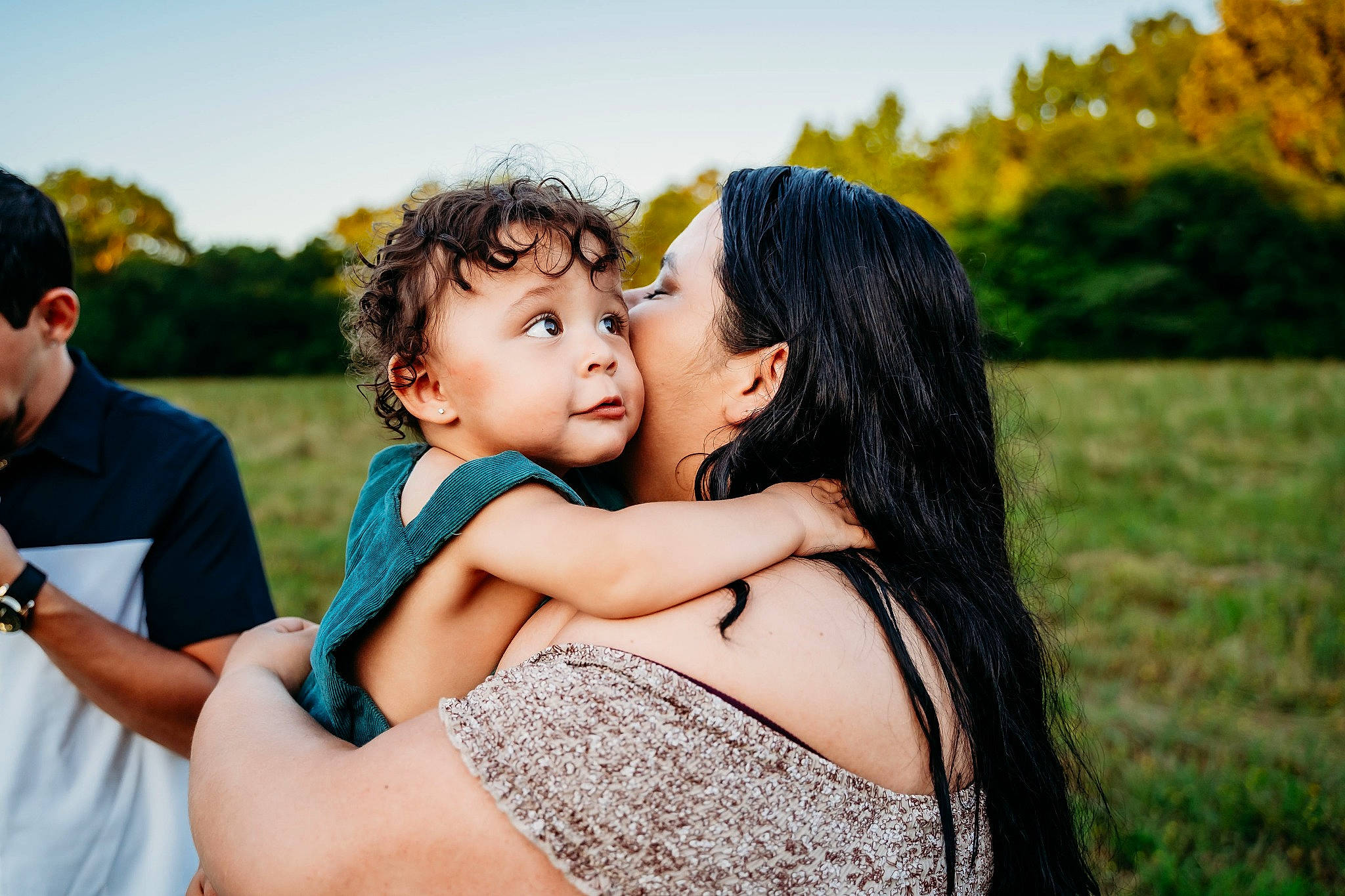 Bellamy is registered to the contest to win money with this photo: arm, beauty, black_hair, dress, event, face, flash_photography, friendship, fun, gesture, grass, hand, happy, leisure, people_in_nature, person, plant, sky, sunlight, tree