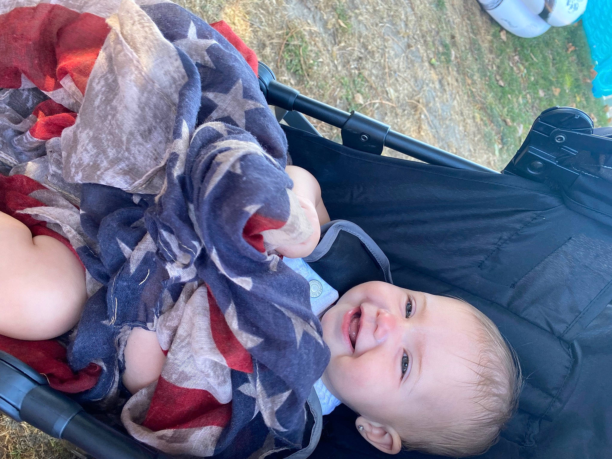 Emmerson is registered to the contest to win money with this photo: baby, baby_products, baby_toddler_clothing, blue, child, electric_blue, fun, grass, happy, hat, joy, leg, leisure, light, person, recreation, red, smile, summer, toddler