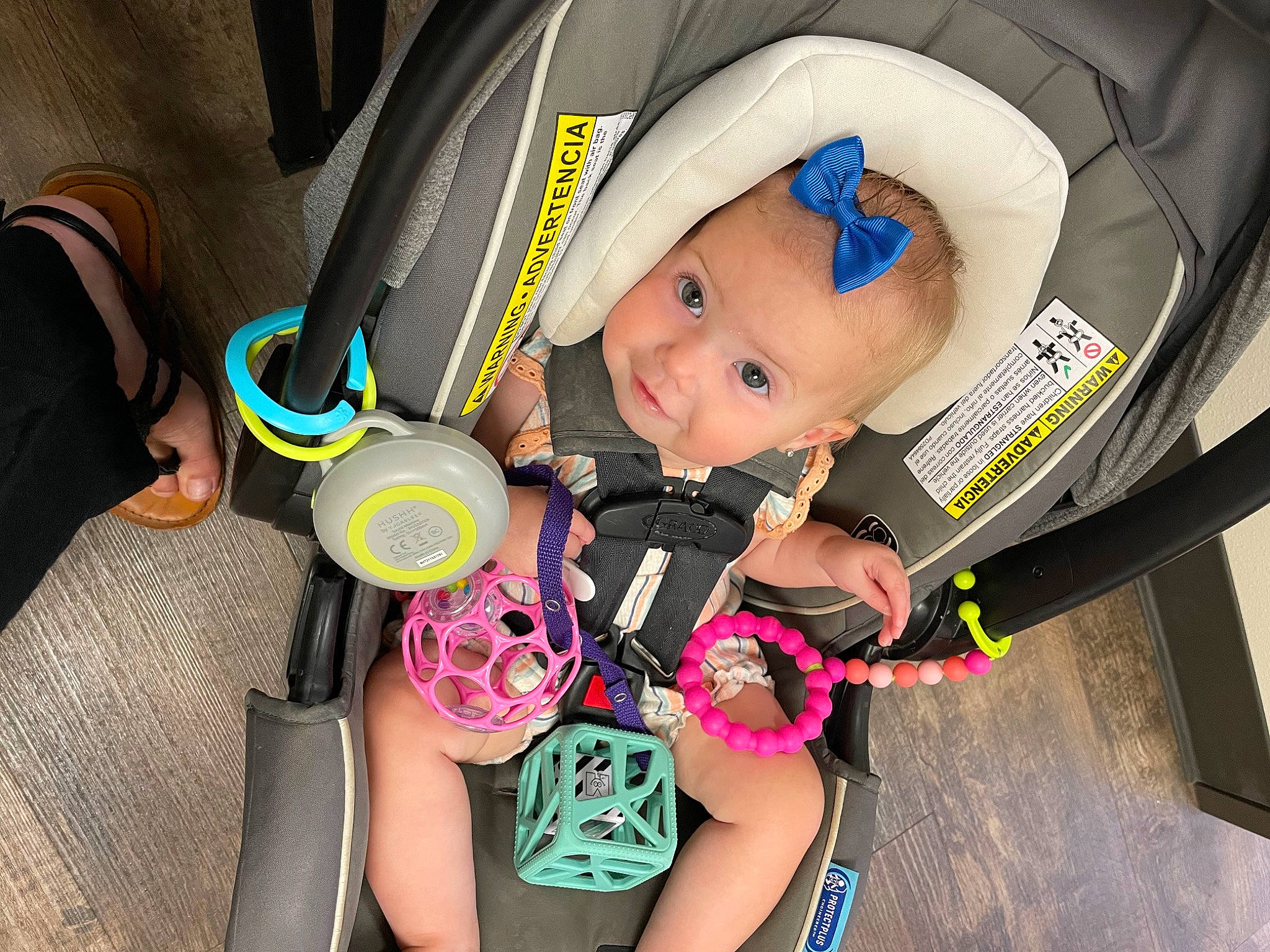 Emmerson is registered to the contest to win money with this photo: auto_part, baby, baby_carriage, baby_products, baby_safety, baby_toddler_clothing, car_seat, cheek, comfort, electric_blue, eye, fashion_accessory, fun, happy, head, iris, person, product, smile, toddler