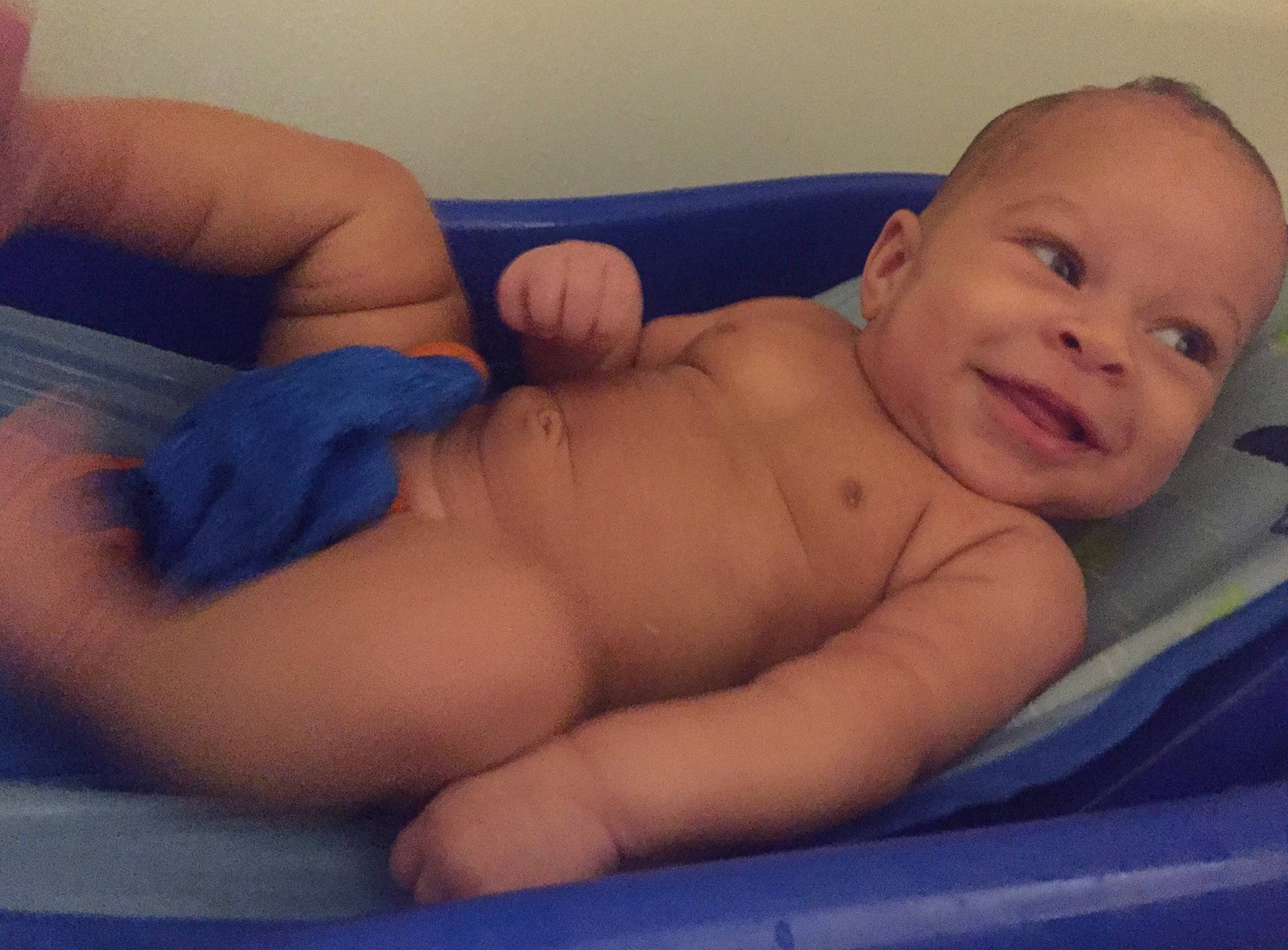 Kyland is registered to the contest to win money with this photo: arm, baby, baby_bathing, baby_making_funny_faces, barechested, bathing, cheek, chest, child, face, hand, mouth, muscle, nose, person, skin, stomach, toddler