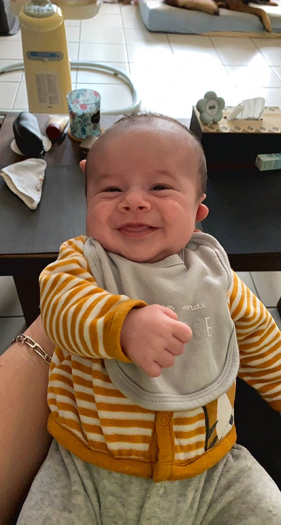 Ethan participe au concours pour gagner de l'argent avec cette photo : baby, baby_products, baby_toddler_clothing, bib, chair, cheek, child, comfort, eye, face, happy, head, joy, mouth, person, room, sitting, skin, sleeve, smile