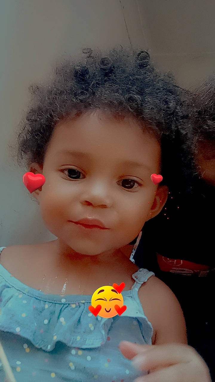 Hélèna participe au concours pour gagner de l'argent avec cette photo : afro, baby_toddler_clothing, cheek, chin, dress, eye, eyebrow, eyelash, face, fashion_design, forehead, hairstyle, happy, headgear, iris, lip, nose, person, pink, skin