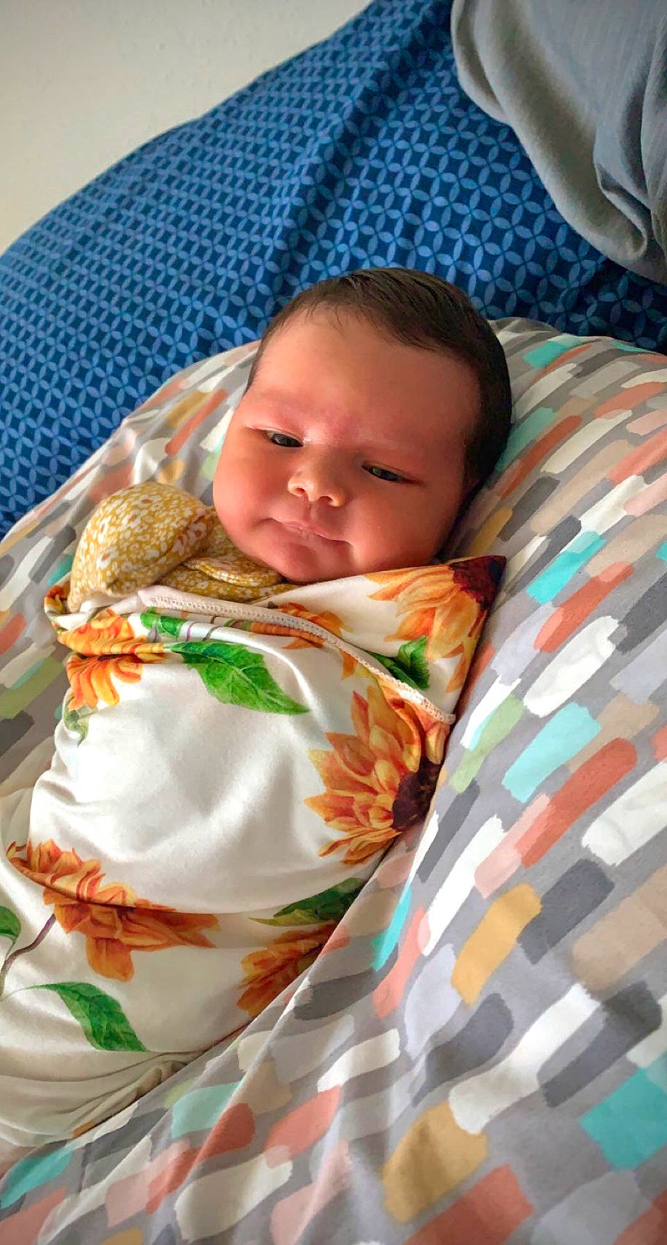 Valerie is registered to the contest to win money with this photo: baby, baby_products, baby_toddler_clothing, bedding, bedtime, blanket, child, comfort, head, linens, nap, orange, pattern, person, room, sleep, sleeve, t_shirt, textile, toddler