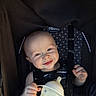Franklin joined the competition — help win amazing prizes! baby, child, smiling, sippy_cup, stroller, seatbelt, polka_dot, clothing, face, head, hand, milk, drinkware, infant, person, portrait, baby_bottle, cute, happy, young