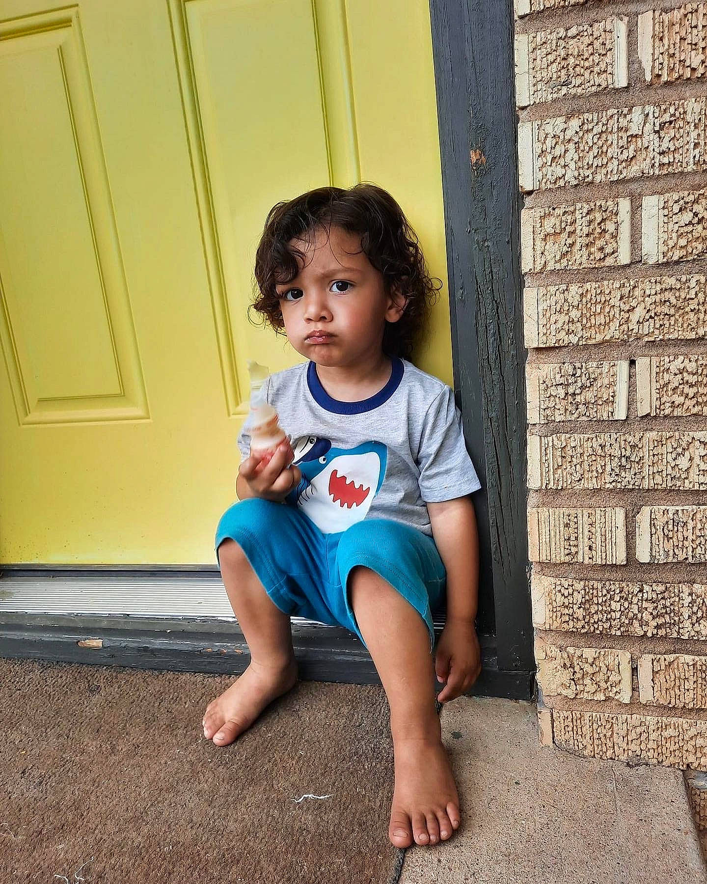 Jordan is registered to the contest to win money with this photo: baby_toddler_clothing, barefoot, beauty, child, electric_blue, eye, face, floor, flooring, happy, human_leg, leg, leisure, person, sleeve, standing, t_shirt, thigh, toddler, waist