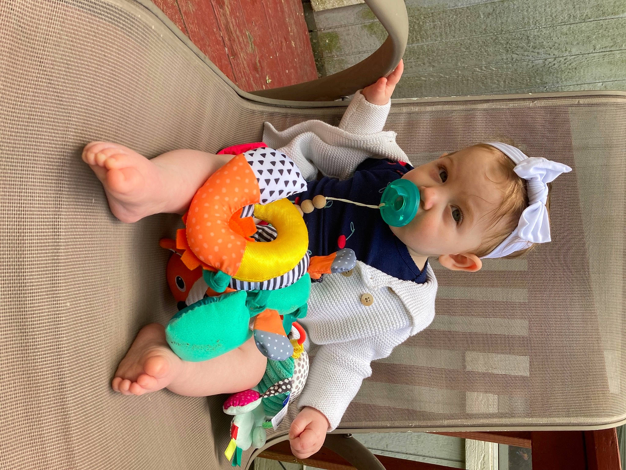 Emma Star is registered to the contest to win money with this photo: baby, baby_products, baby_safety, baby_toddler_clothing, baby_toys, chair, child, comfort, fun, happy, head, linens, orange, person, play, plush, sitting, stuffed_toy, textile, toddler