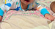 Gursher joined the competition — help win amazing prizes! baby, bed, bedding, child, cozy, curious, cute, expression, face, head, home, indoors, infant, lying, pajamas, person, portrait, room, sleepwear, young