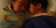 Abraxas is registered to the contest to win money with this photo: baby, infant, sleeping, blanket, hospital, nasal_tube, bed, child, cozy, cute, rest, face, person, healthcare, medical, treatment, indoors, two_people, young, peaceful
