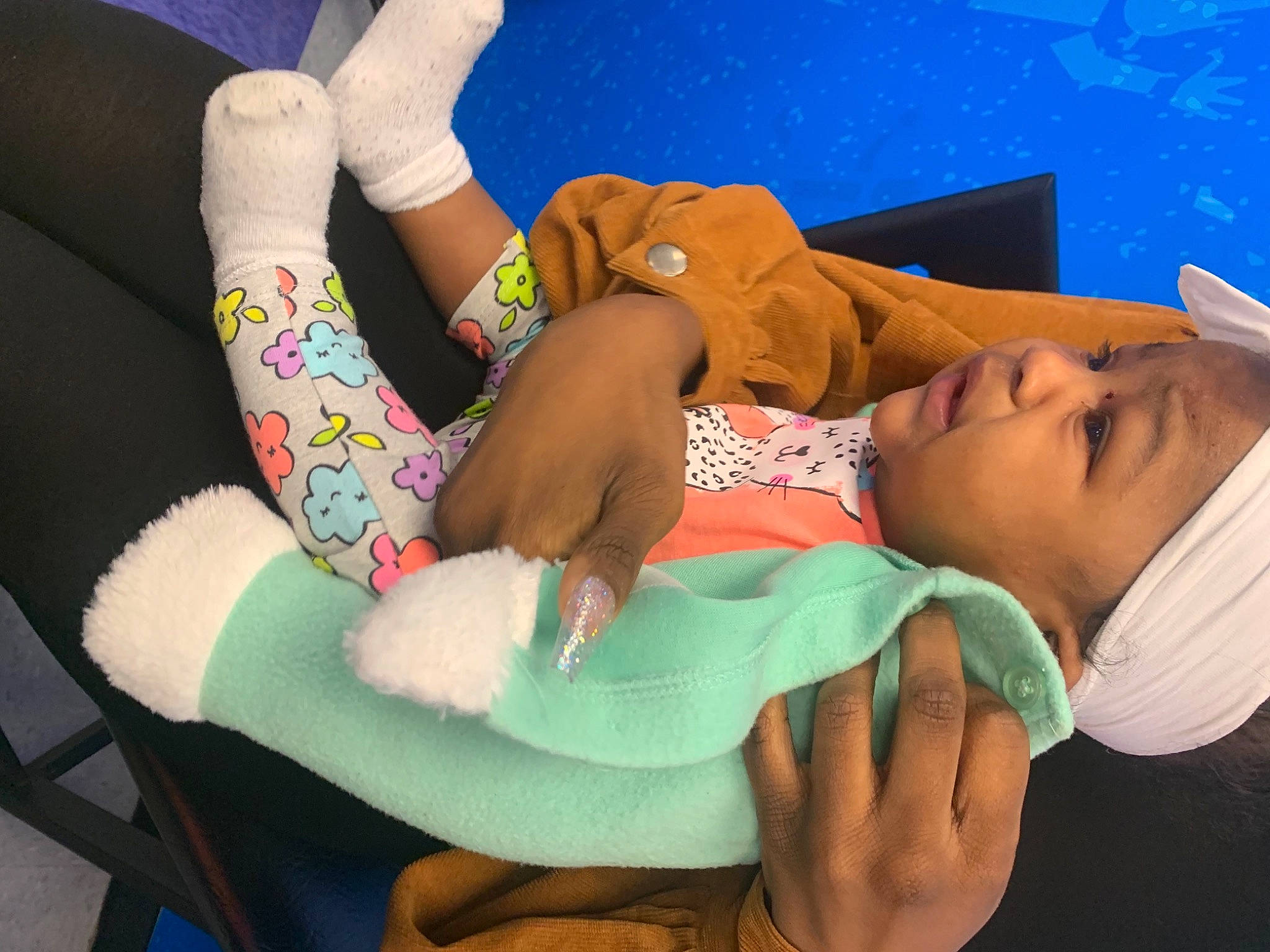 Jamiyah is registered to the contest to win money with this photo: art, child, comfort, elbow, finger, gesture, hand, headgear, headwear, human_body, human_leg, joint, knee, leg, leisure, nail, person, product, thigh, toddler