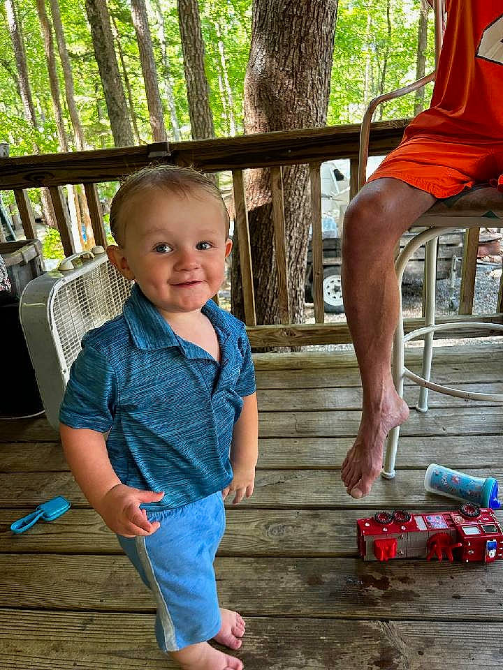 Dakota joined the competition — help win amazing prizes! child, electric_blue, fun, grass, happy, human_body, joint, joy, leg, leisure, people, person, plant, porch, recreation, shorts, smile, standing, summer, toddler