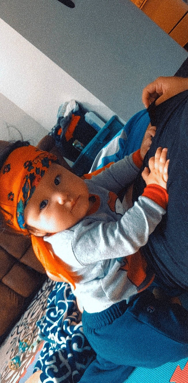 Leroy is registered to the contest to win money with this photo: baby, baby_products, bag, baseball_cap, beanie, cap, child, comfort, fun, fur, hat, headwear, lap, nap, person, personal_protective_equipment, plush, room, sitting, stuffed_toy