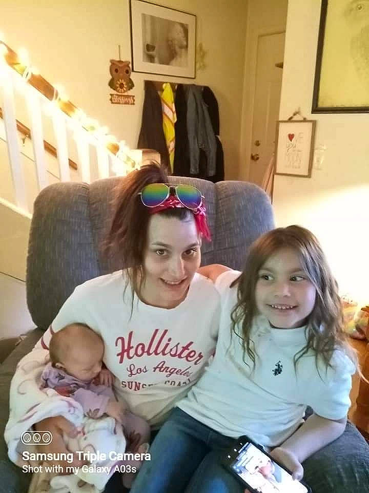 Zoè joined the competition — help win amazing prizes! baby, child, comfort, couch, event, eyewear, fun, happy, joy, lap, leisure, living_room, person, picture_frame, room, sitting, smile, sunglasses, t_shirt, thigh