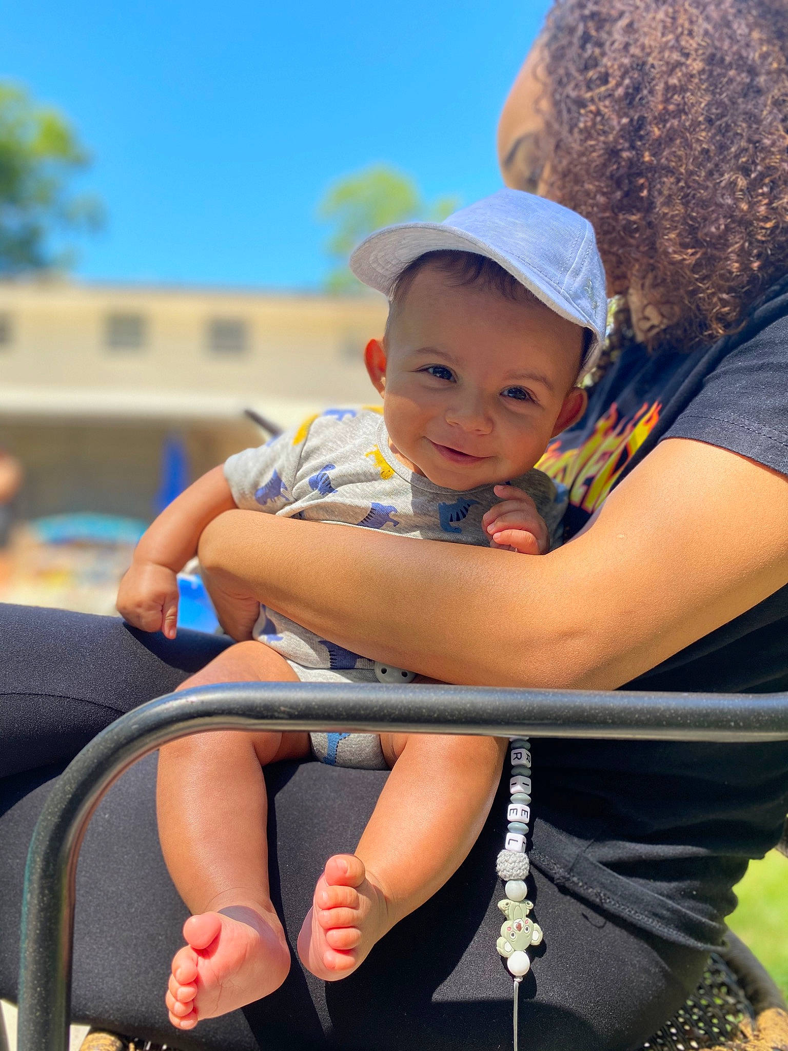 Ezriel is registered to the contest to win money with this photo: baby, baby_carriage, baby_products, child, fun, hand, headgear, joy, leg, leisure, people, person, photography, product, sitting, skin, smile, summer, toddler, vacation