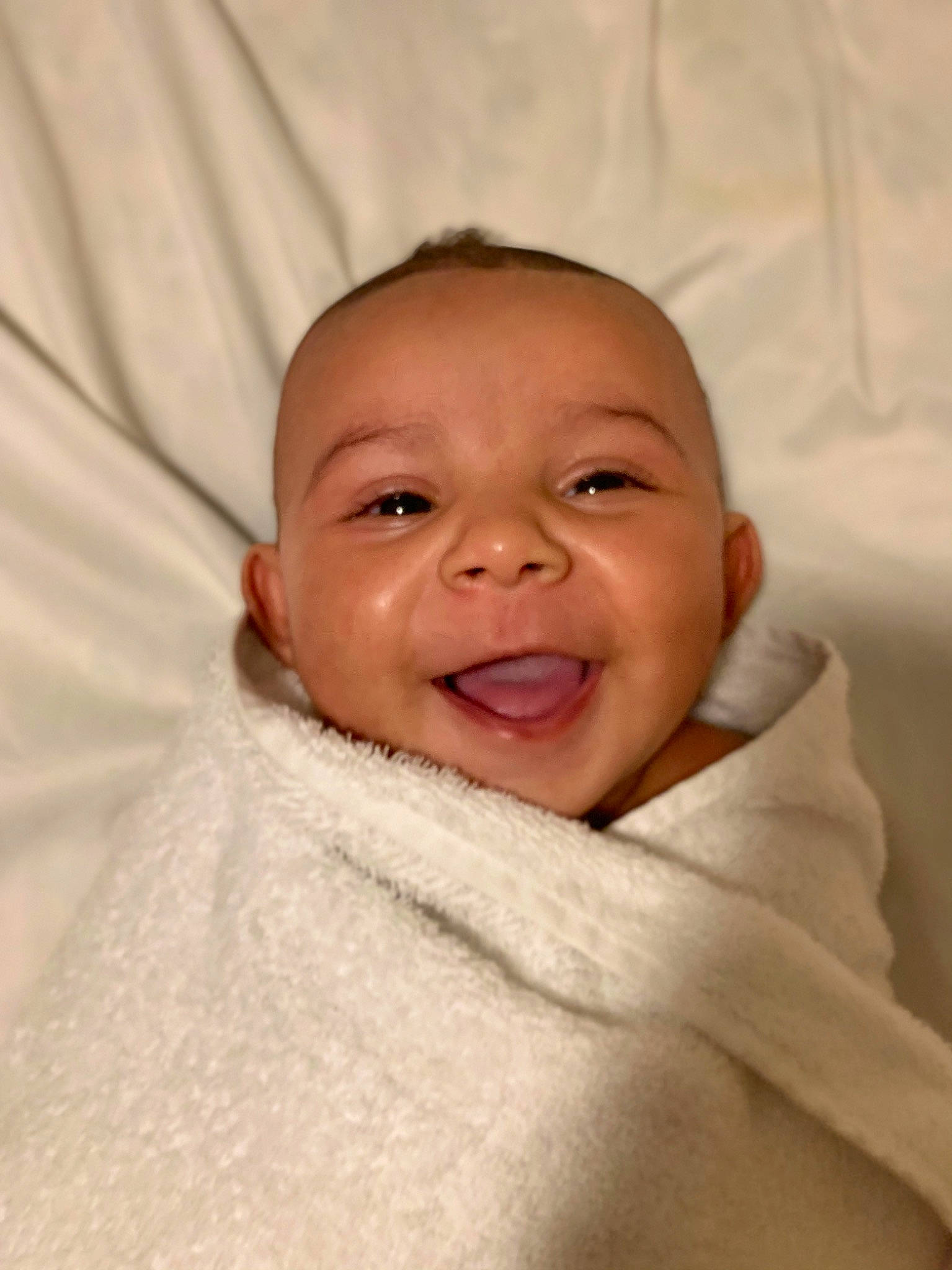 Ezriel is registered to the contest to win money with this photo: baby, baby_making_funny_faces, cheek, child, chin, close_up, eye, eyebrow, face, facial_expression, forehead, head, lip, mouth, nose, person, skin, smile, toddler