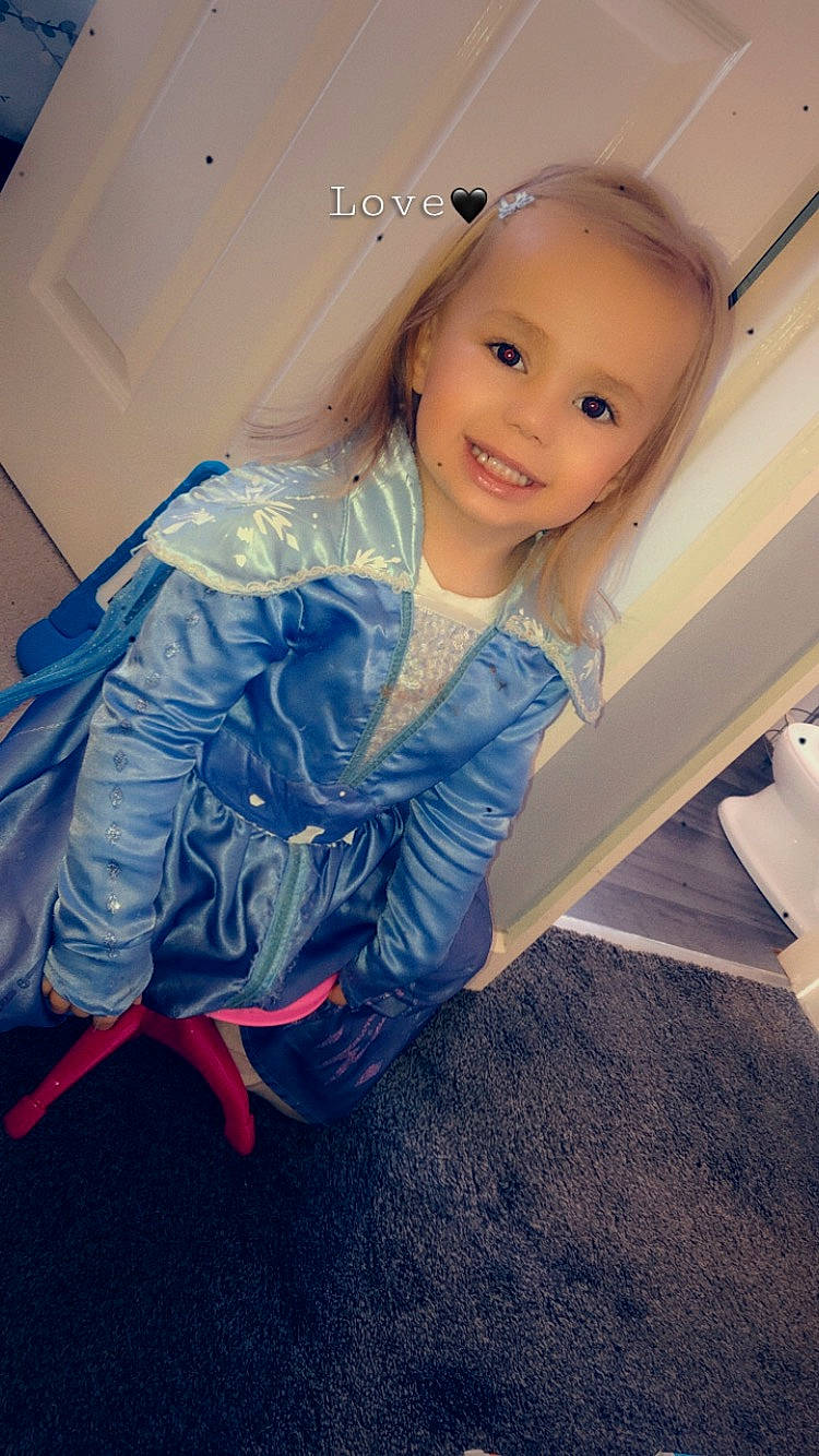 Lilly-mae is registered to the contest to win money with this photo: auto_part, automotive_design, automotive_wheel_system, baby, baby_toddler_clothing, blond, child, comfort, electric_blue, eye, flash_photography, flooring, fun, happy, human_leg, joy, leisure, person, sitting, smile