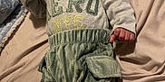 Andres joined the competition — help win amazing prizes! baby, bed, blanket, child, clothing, corduroy, cute, face, foot, hand, hat, indoors, infant, lying_down, newborn, pants, person, sleepwear, soft, warm