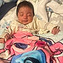 Andres joined the competition — help win amazing prizes! newborn, baby, sleeping, blanket, cozy, indoors, soft, cute, infant, child, portrait, warm, comfort, clothing, resting, peaceful, toddler, bed, colorful, snuggled